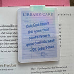Holographic library-card style Catholic magnetic bookmarks with saint quotes